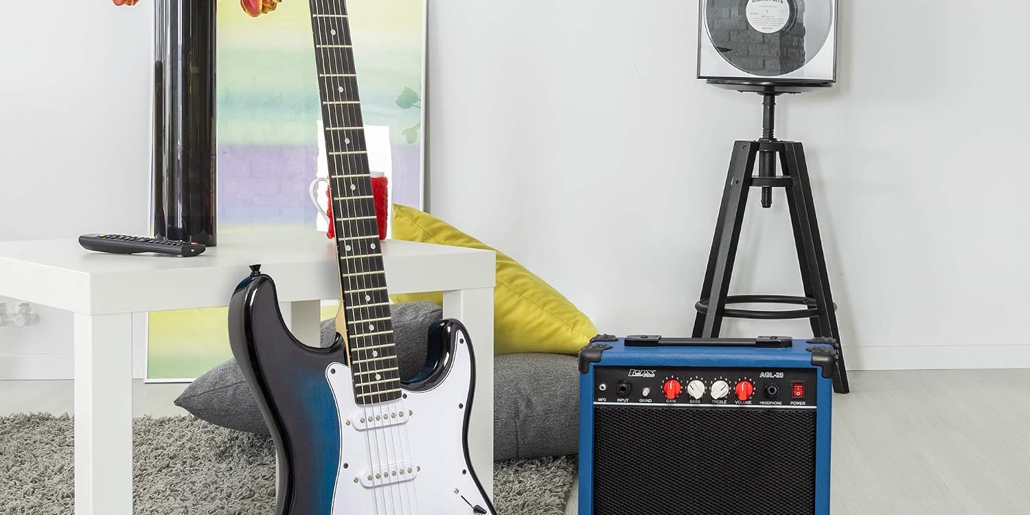 LyxPro 39 inch electric guitar and 20W amp set up in a bedroom practice corner