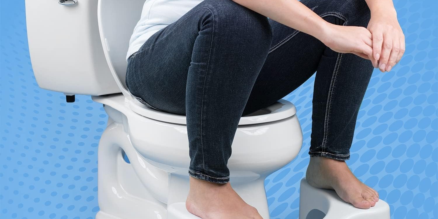 Proper squat position on the Simple Curve stool: knees above hips, feet resting naturally on the curved platforms